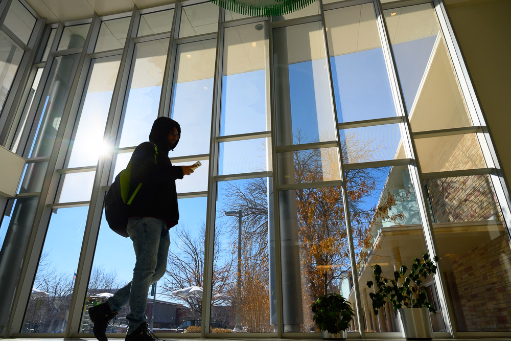 Student walking through the Lory Student Center